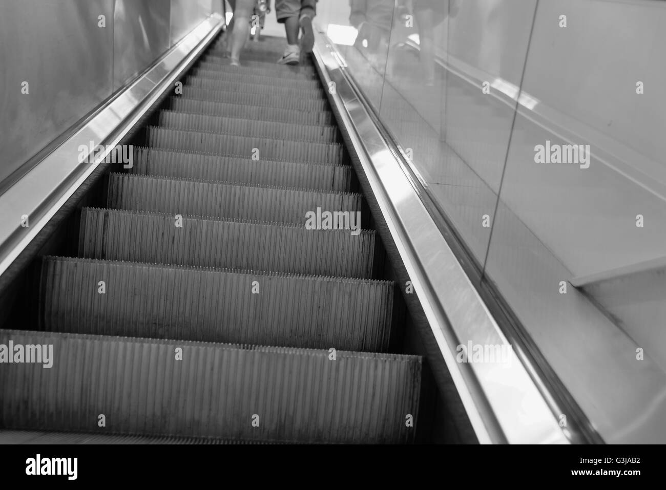 Menschen mit einer Rolltreppe Stockfoto