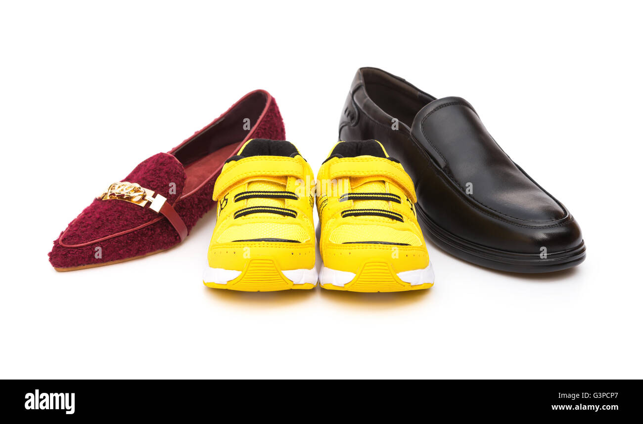 Schuhe für Vater-Mutter und Sohn auf einem weißen Hintergrund Stockfoto