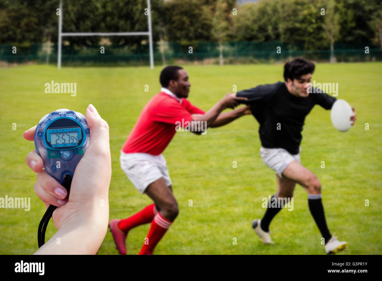 Nahaufnahme von einer Hand hält einen timer Stockfoto