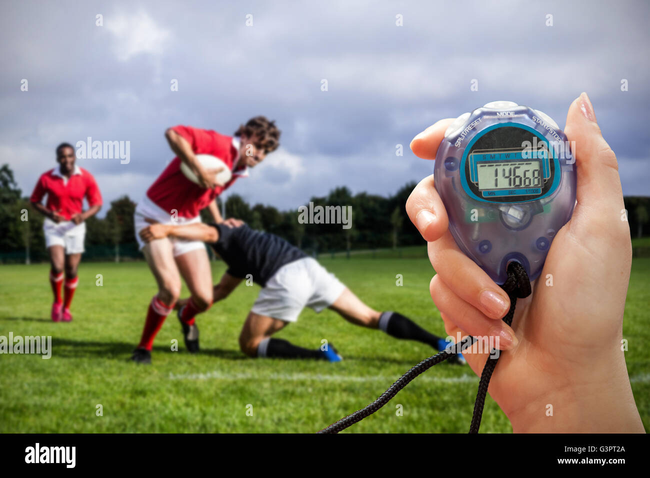 Nahaufnahme von einer Hand hält einen timer Stockfoto