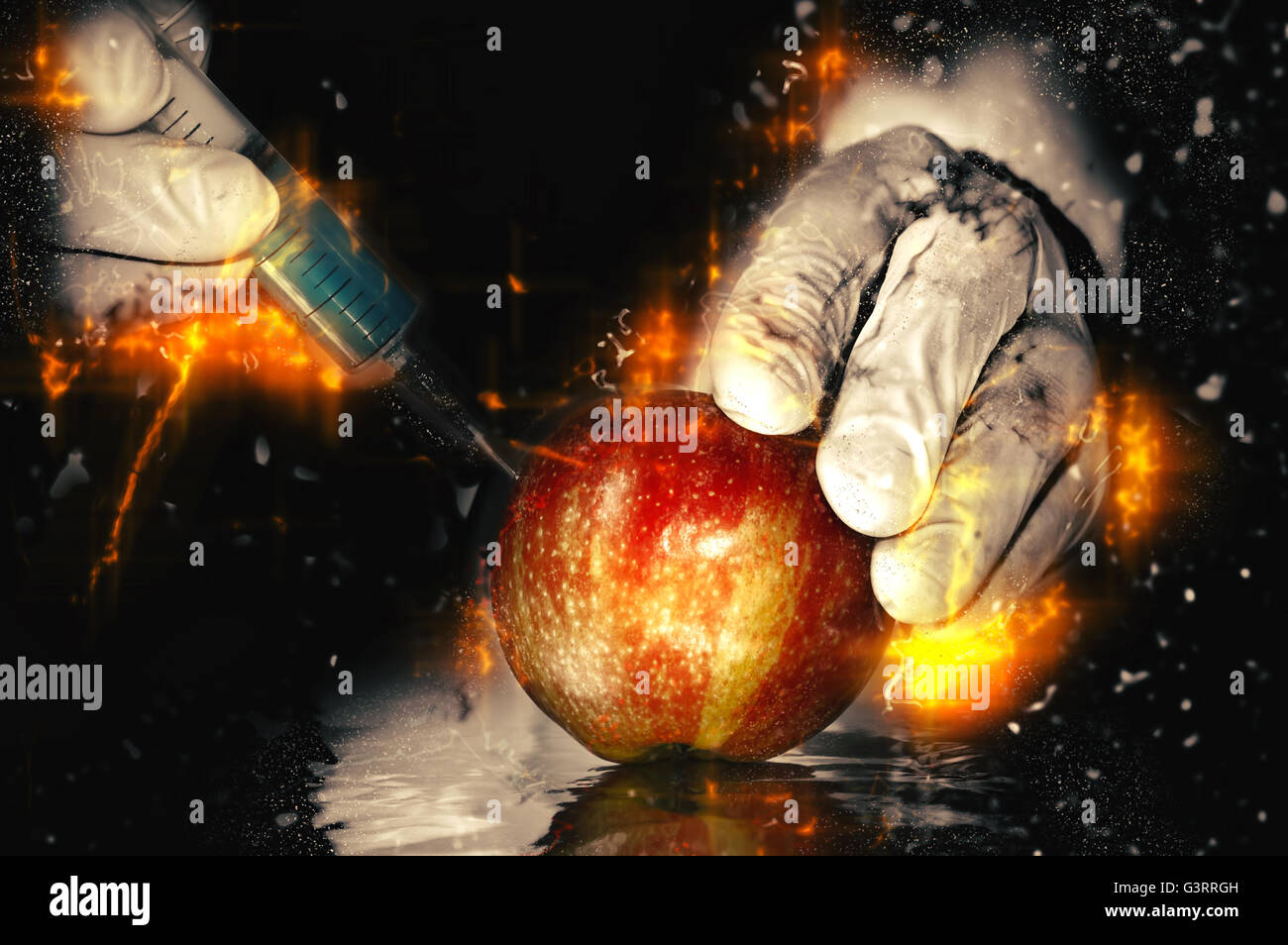 Roter Apfel im Gentechnik-Labor, GVO-Food-Konzept. Abbildung Feuer. Stockfoto