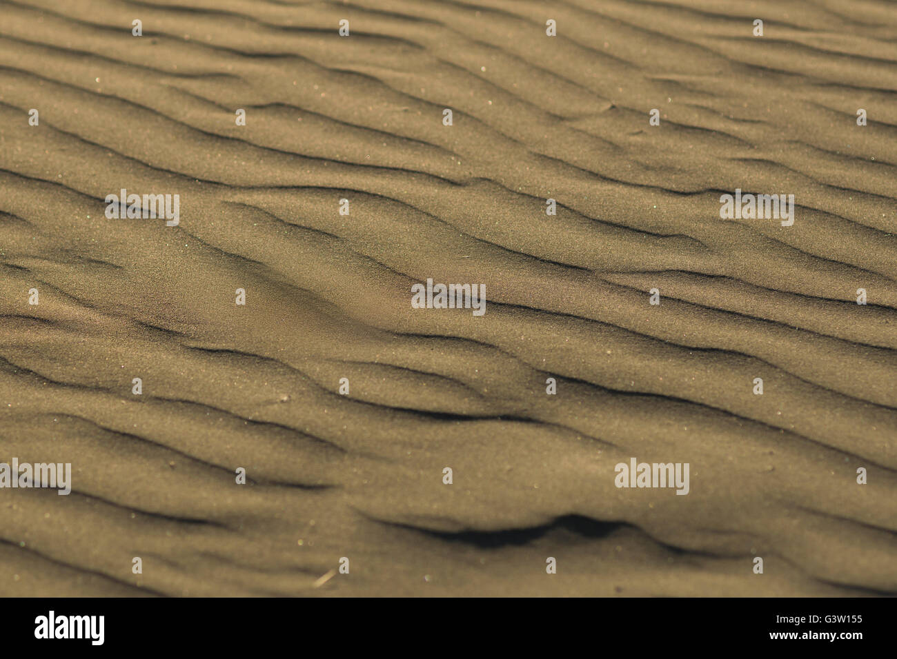 Strandsand Stockfoto