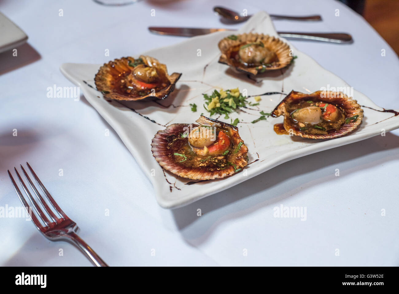 Gebackene Jakobsmuscheln Stockfoto