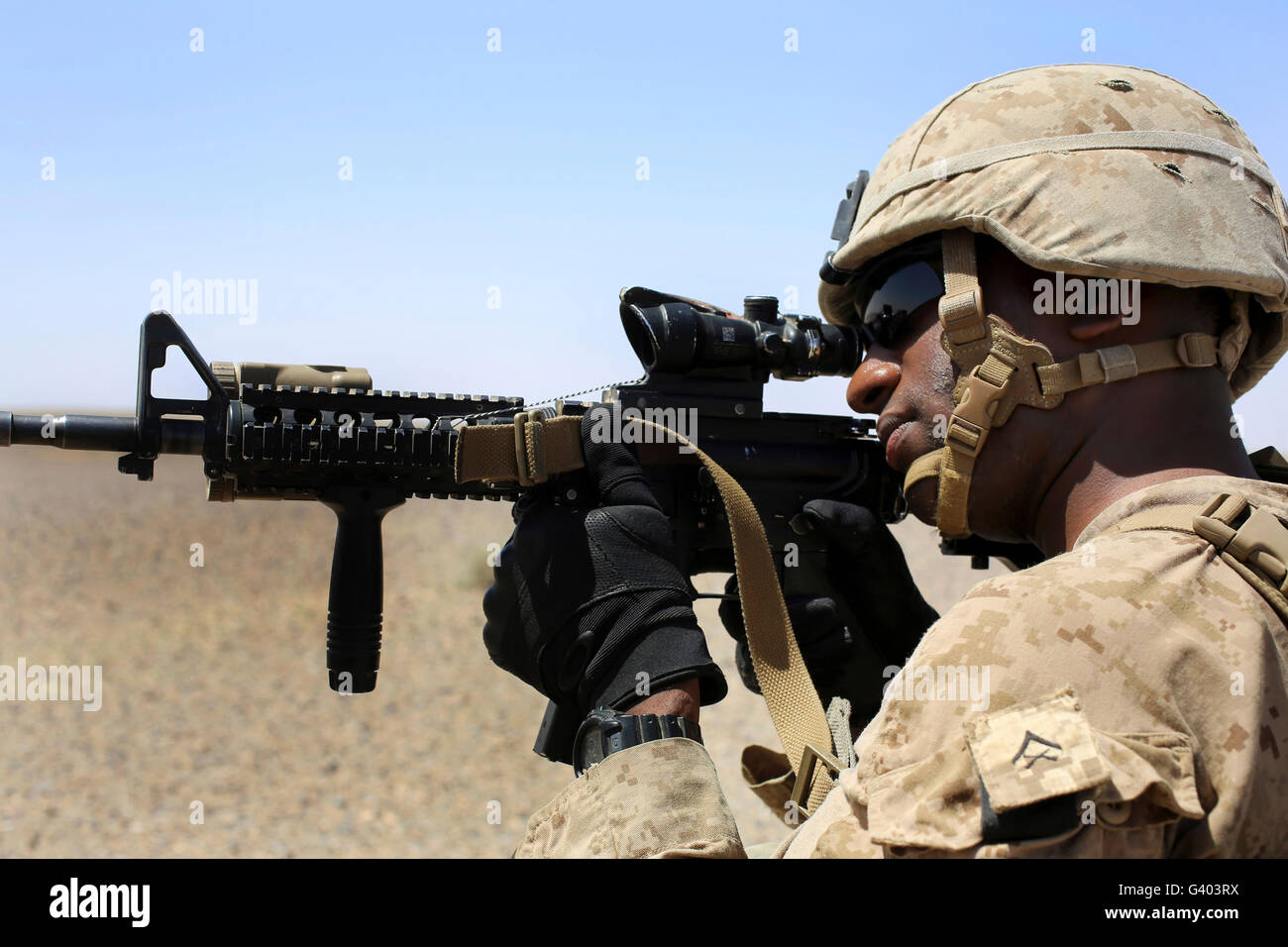 US-Marine hält Sicherheit während einer Patrouille in Afghanistan. Stockfoto