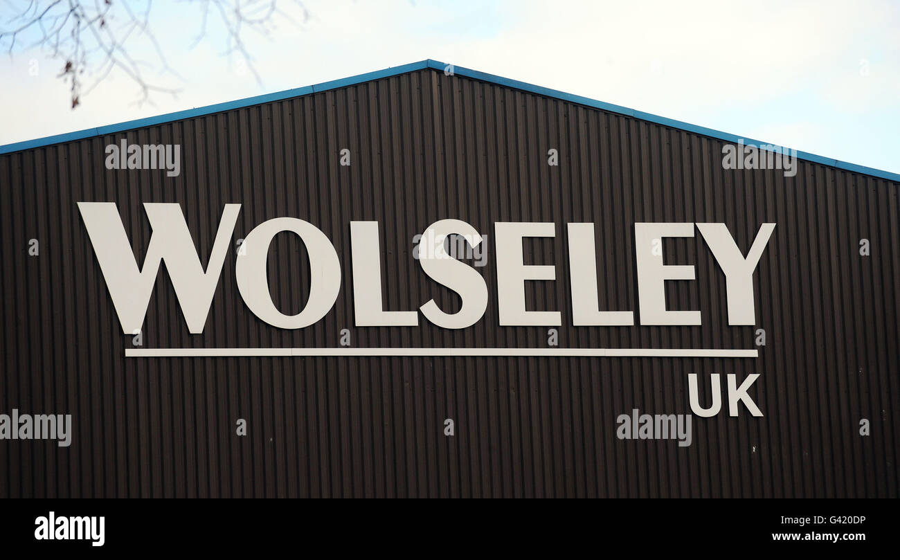 FTSE 100. Eine allgemeine Ansicht eines Schildes auf dem Lagerhaus im Wolseley Center in Ripon, North Yorkshire Stockfoto