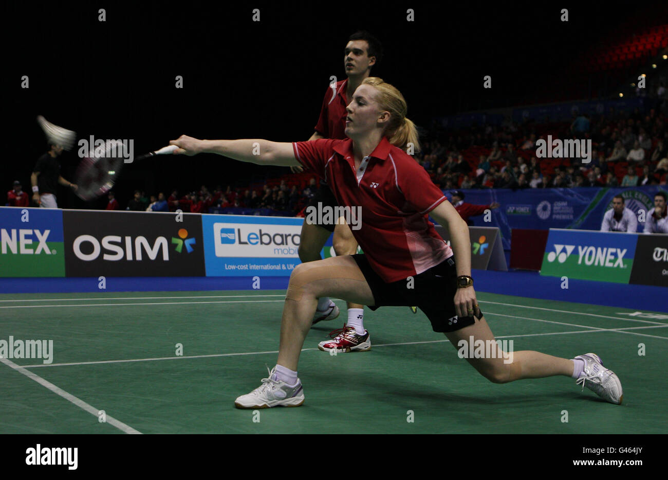 Die Schottlands Imogen Bankier und Chris Adcock (England) siegten im Mixed Doubles während der Yonex All England Championships in der National Indoor Arena in Birmingham im 1. Lauf gegen die Japaner Shintaro Ikeda und Reiko Shiota. Stockfoto