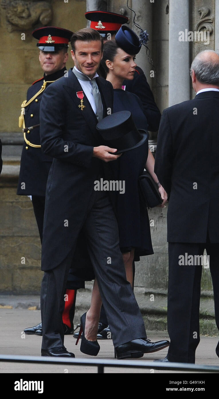 David und Victoria Beckham kommen vor der Hochzeit zwischen Prinz William und Kate Middleton in der Westminster Abbey an. Stockfoto