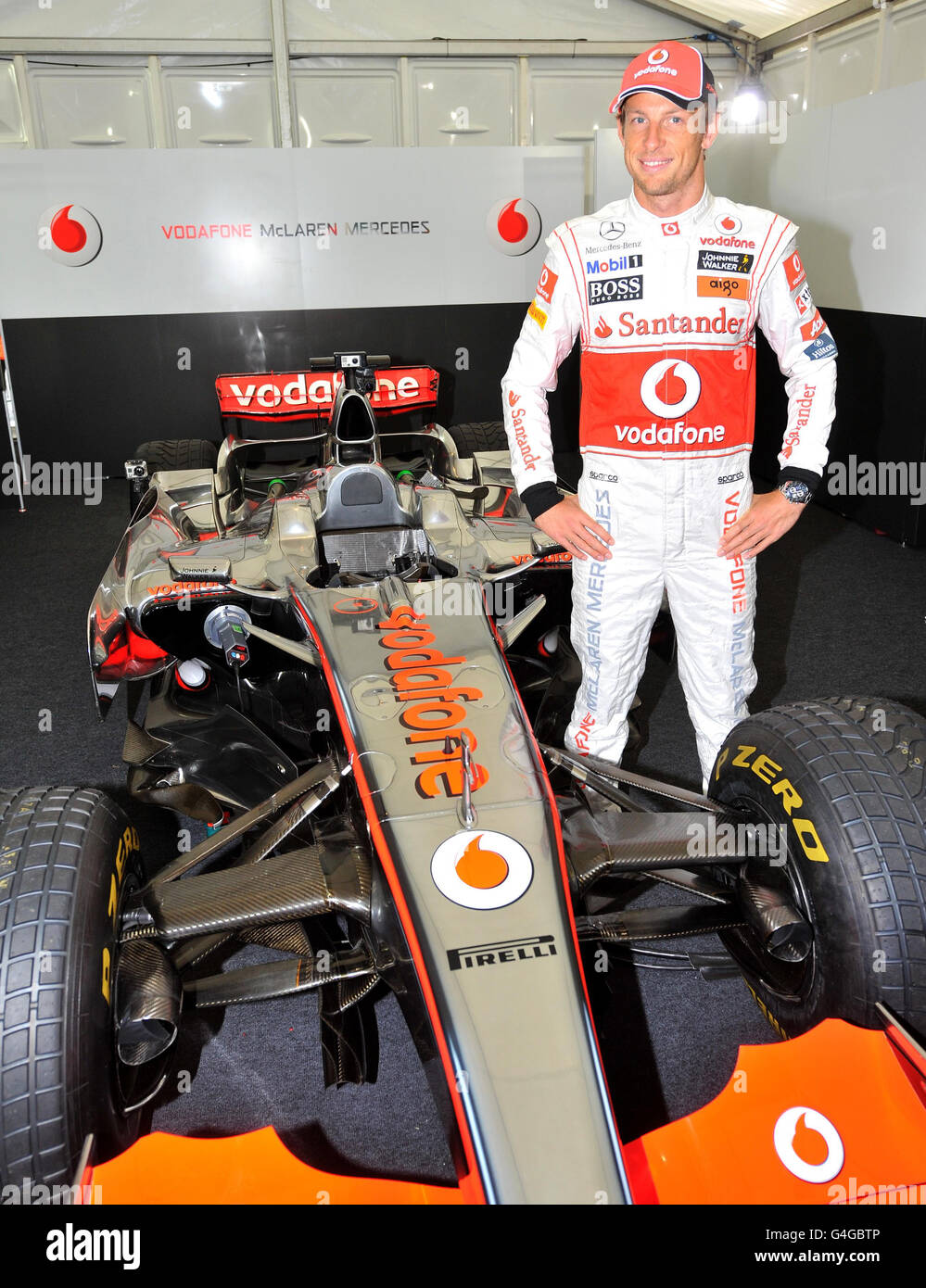 Formel 1 - Jenson Button fährt durch die Straßen von Manchester. McLaren  Mercedes' Jenson-Taste während der Fotozelle in Manchester Stockfotografie  - Alamy