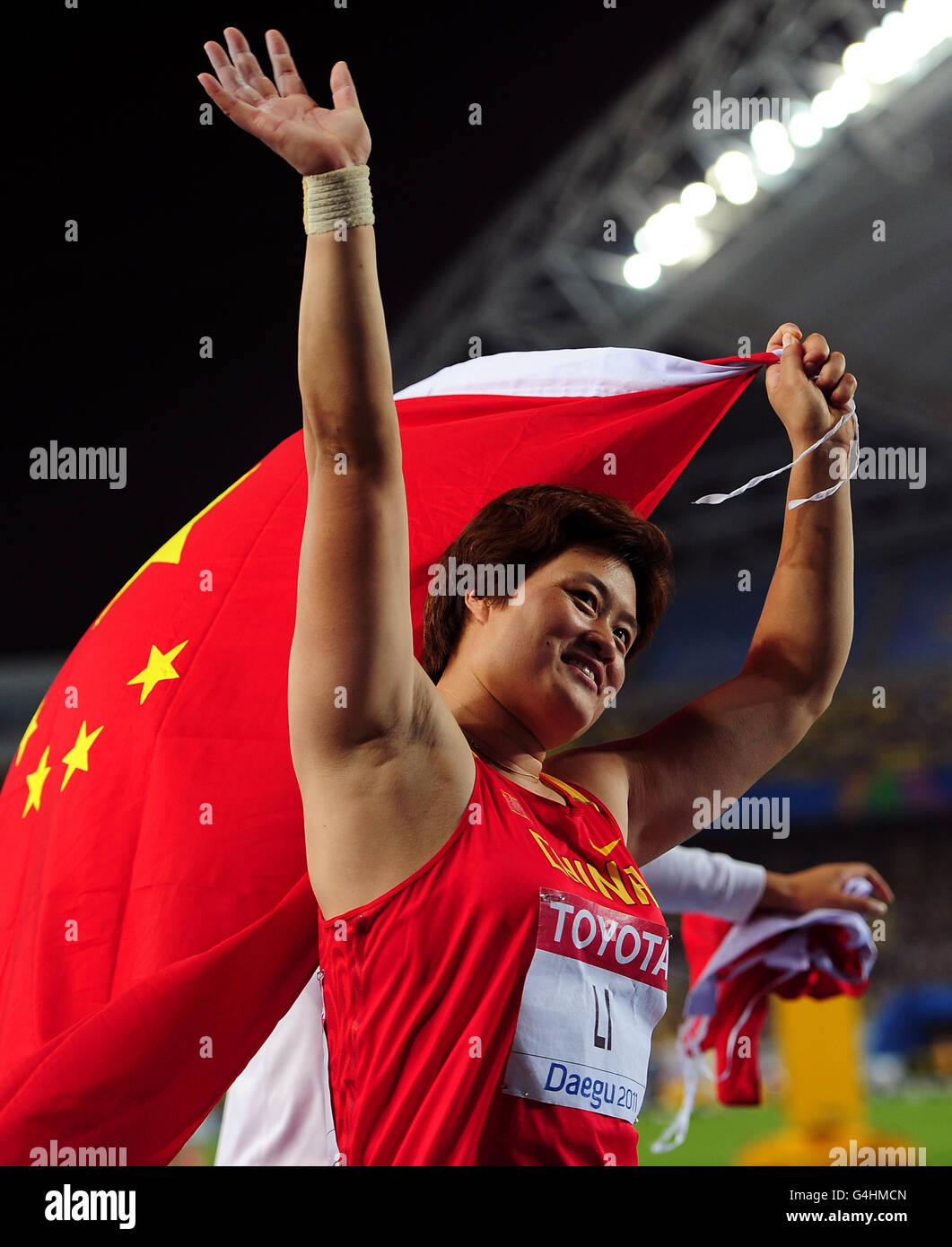 Leichtathletik - IAAF Weltmeisterschaften 2011 - Tag zwei - Daegu. Der chinesische Yanfeng Li feiert den Sieg des Diskus Stockfoto