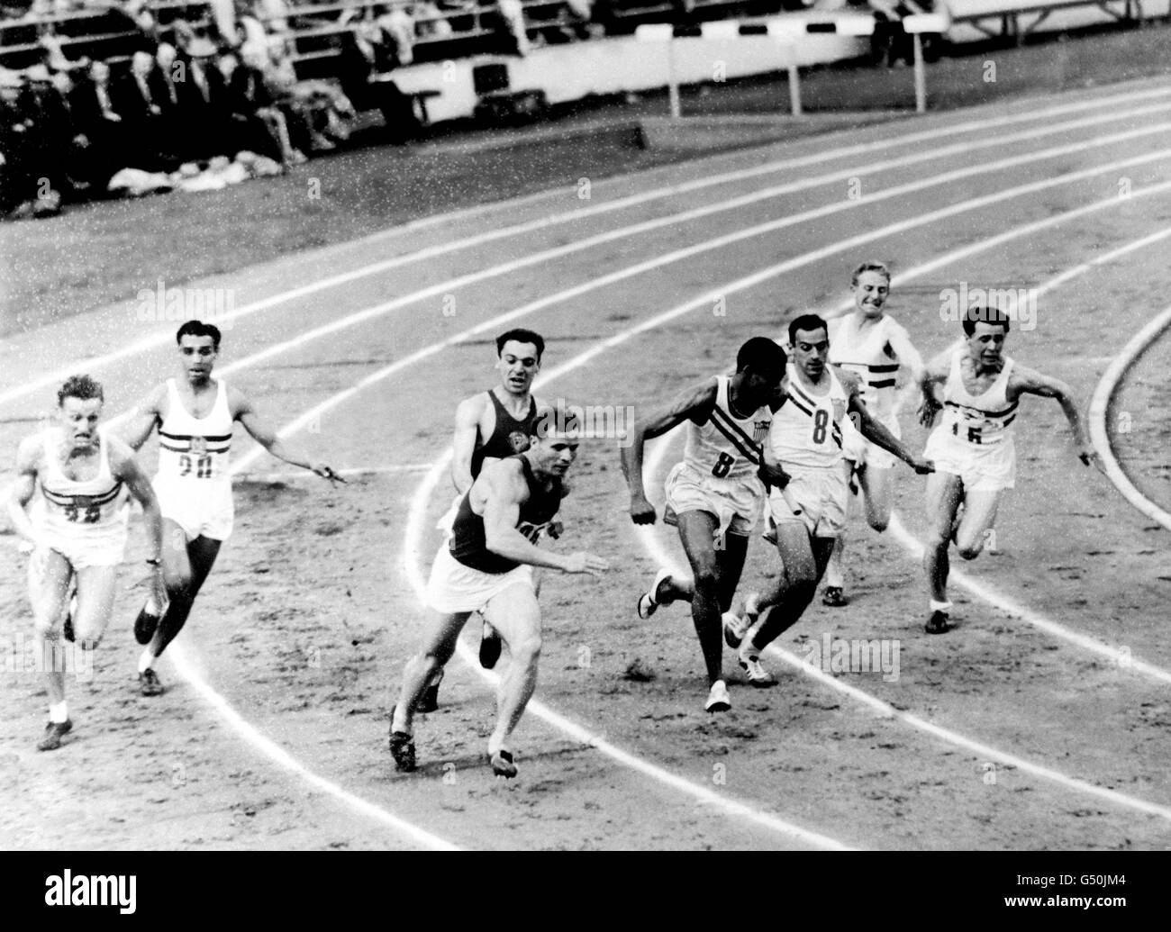 Ein Wechsel während der 4 x 400 Meter langen Staffel, gewonnen von Jamaika, mit den USA Zweiter und Deutschland Dritter. Stockfoto