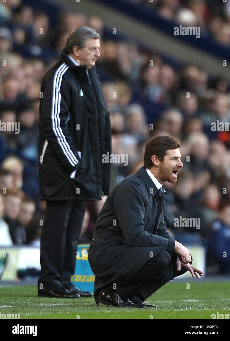 Chelsea-Manager Andre Villas-Boas (rechts) hockt vor West Bromwich Albion Manager Roy Hodgson auf der Touchline Stockfoto