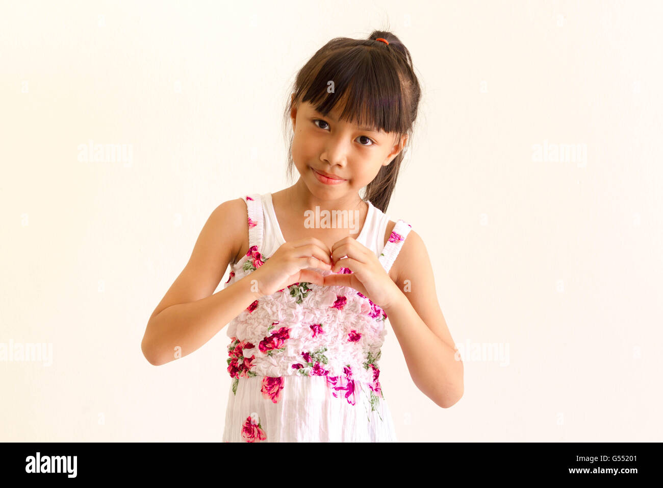 Asiatische Mädchen Kind ist Ausdruck der Liebe Stockfoto