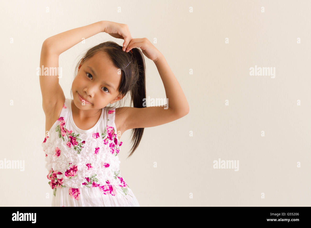 Asiatische Mädchen Kind ist Ausdruck der Liebe Stockfoto