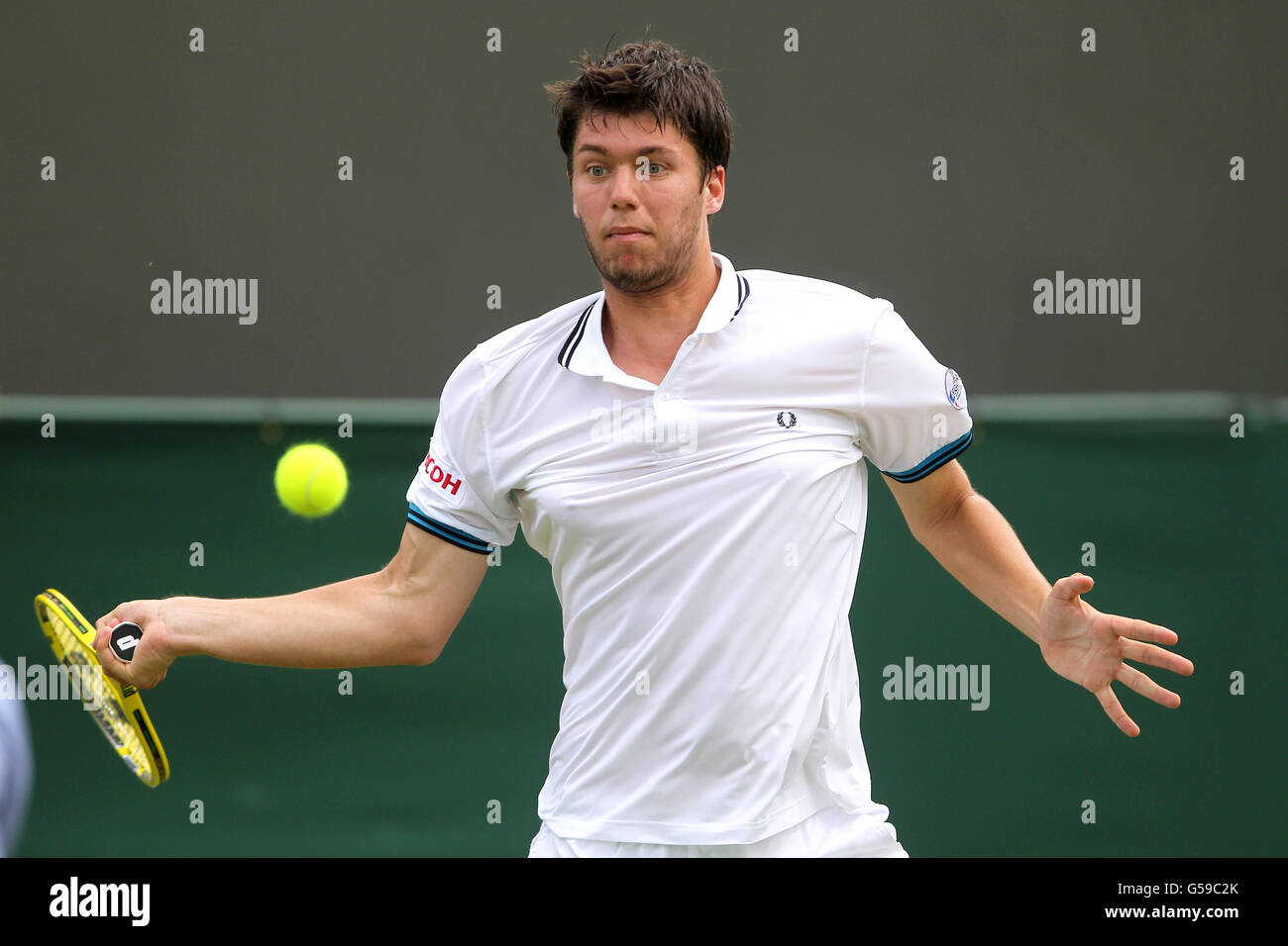 Tennis - Wimbledon Championships 2012 - erster Tag - All England Lawn Tennis und Croquet Club. Oliver Golding, Großbritannien Stockfoto