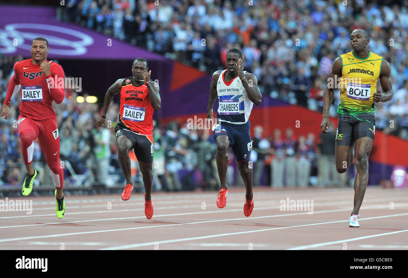 (Von links nach rechts) der US-Amerikaner Ryan Bailey, Antiguas Daniel Bailey, Großbritanniens Dwain Chambers und Jamiacas Usain Bolt treten am neunten Tag der Olympischen Spiele 2012 in London im Halbfinale der Männer im Olympiastadion an. Stockfoto