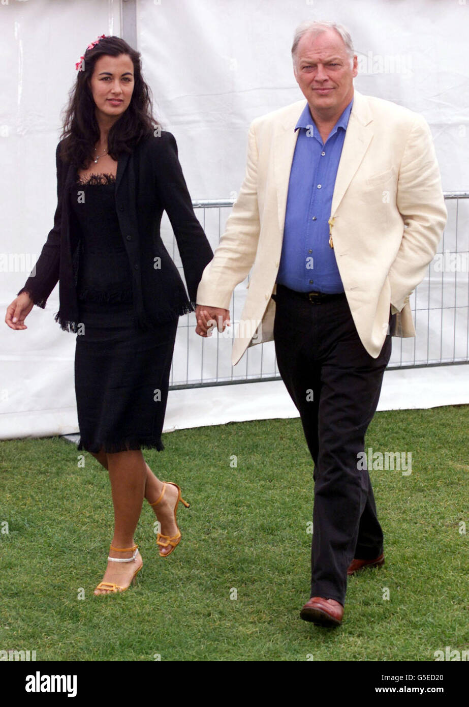 Veuve Clicquot Gilmour. Dave Gilmour aus der Gruppe Pink Floyd mit Frau Polly im Cowdrey Park für den Veuve Clicquot Gold Cup. Stockfoto