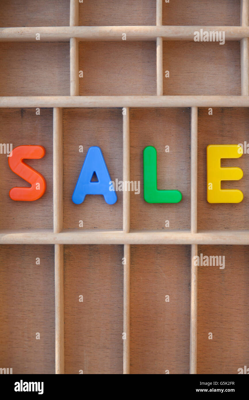 Verkauf Text Buchstaben in einem Vintage Groß-/Kleinschreibung Stockfoto