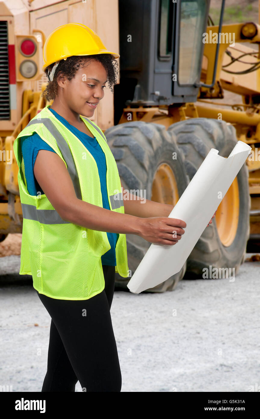 Weibliche Bauarbeiter auf einer Baustelle Stockfoto