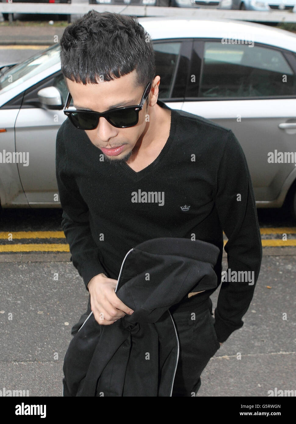 N-Dubz Rapper Dappy, richtiger Name Dino Costas Contostavlos, am Guildford Crown Court, wo er wegen Affray nach einem Vorfall an einer Tankstelle angeklagt wird, bei dem drei Männer schwere Gesichtsverletzungen erlitten haben. Stockfoto