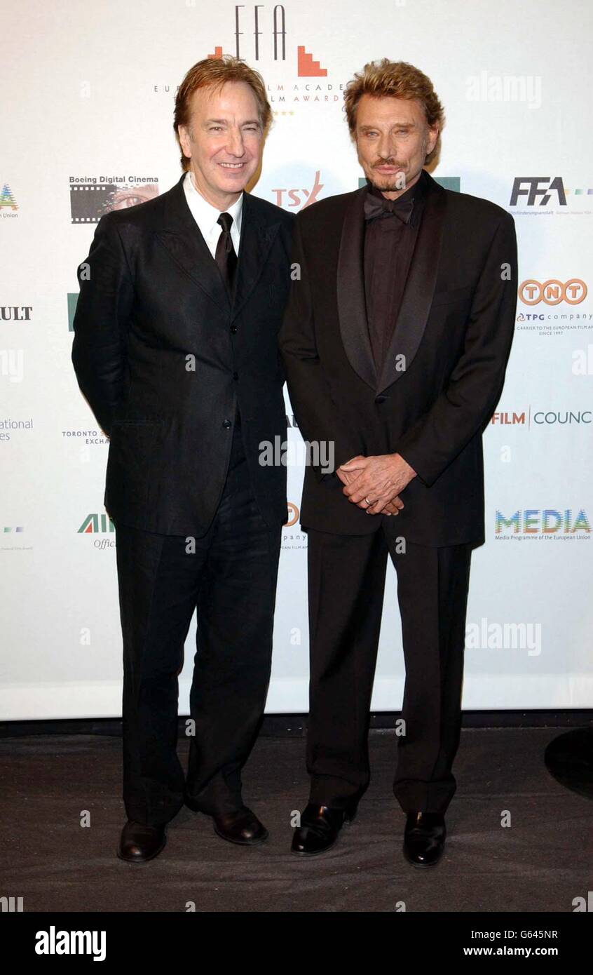 Schauspieler Alan Rickman und Johnny Hallyday während der Europäischen Filmpreise 2002 am Teatro dell'Opera di Roma, Rom, Italien. Stockfoto