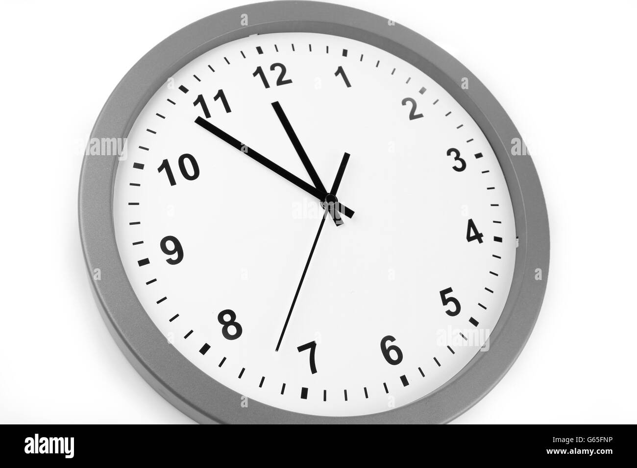 Uhr auf einfarbigen Hintergrund isoliert Stockfoto