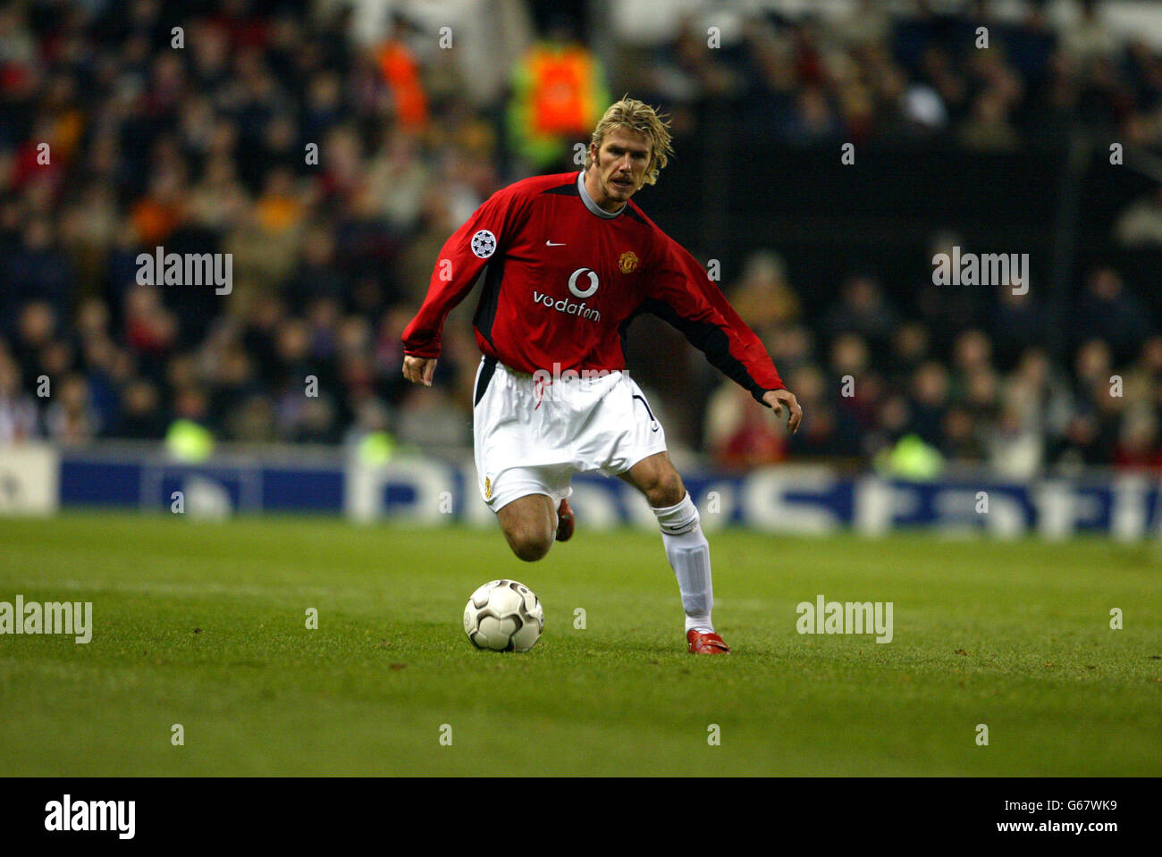 David Beckham im Einsatz für Manchester United gegen Deportivo La Coruna im Phase-2-Spiel der Gruppe D in der UEFA Champion's League in Old Trafford. Stockfoto