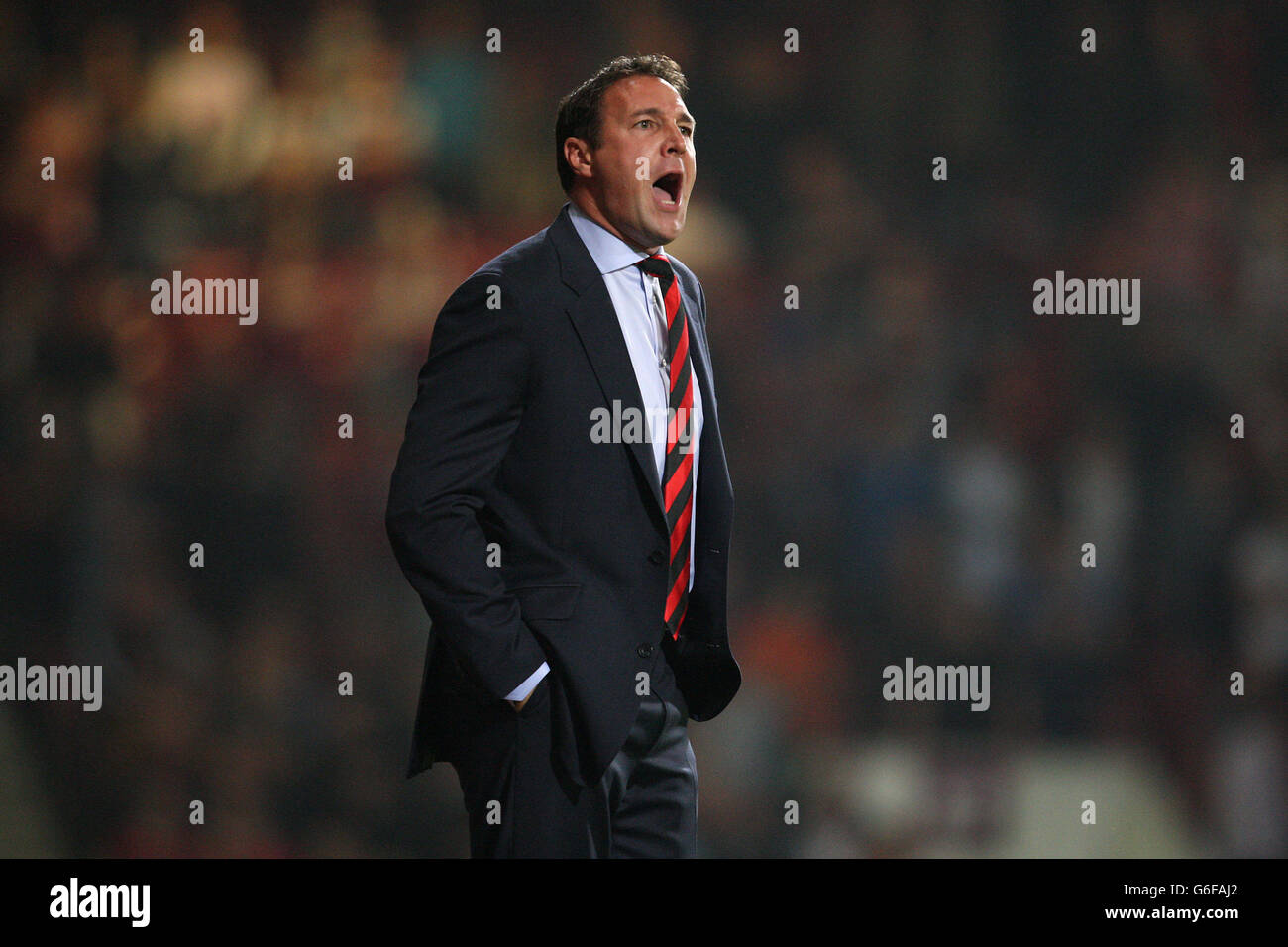 Der Manager von Cardiff City, Malky Mackay, war während des dritten Spiels des Capital One Cup im Upton Park, London, an der Touchline. Stockfoto