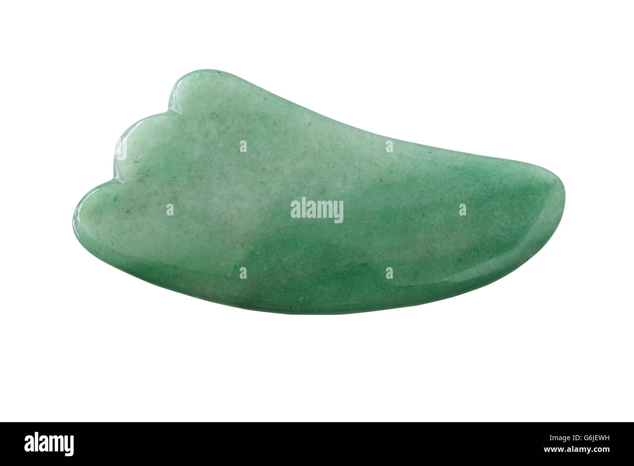 Guasa jade, chinesische Medizin traditionelle Massagewerkzeug Guasha aus Jade hergestellt. Glaube, Entgiftung der Haut und mehr Schönheit. Isolieren Stockfoto