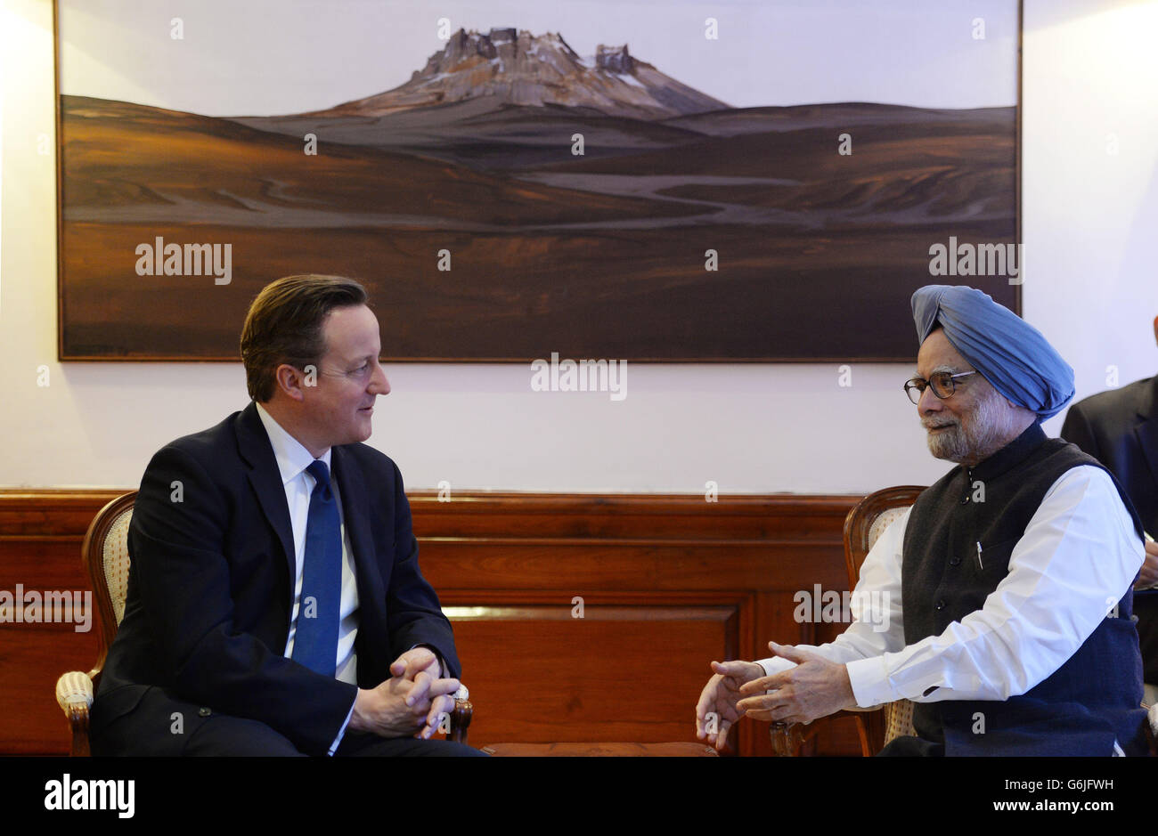 Premierminister David Cameron trifft den indischen Premierminister Manmohan Singh in seiner offiziellen Residenz in Delhi, Indien. Stockfoto
