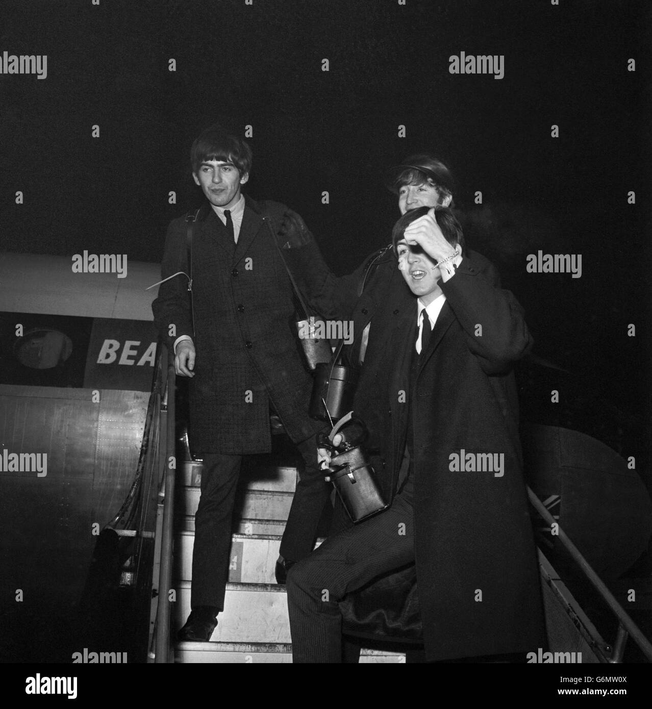 Musik - die Beatles - George Harrison, John Lennon und Paul McCartney - London Flughafen Stockfoto