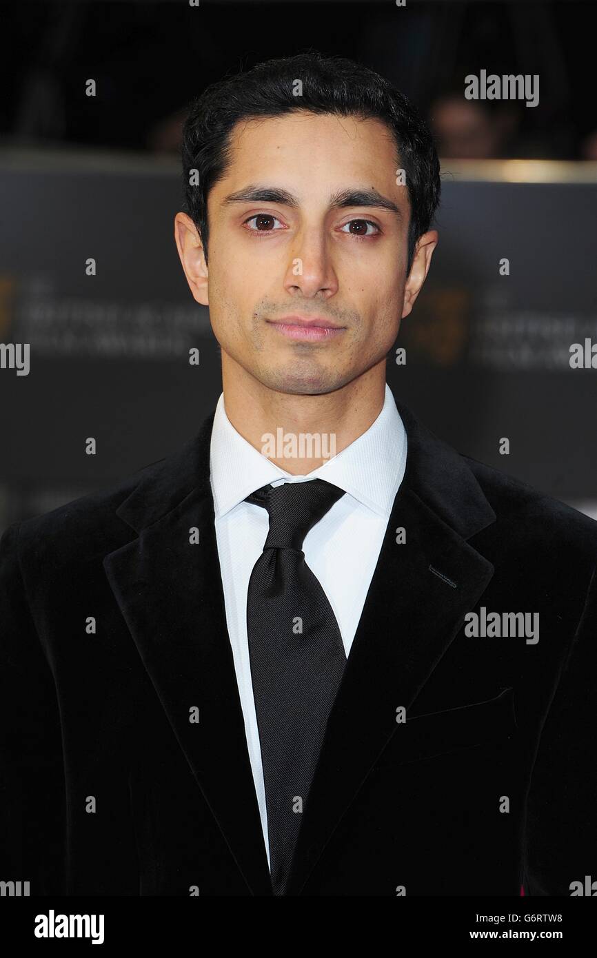 RIZ Ahmed bei der Ankunft bei den EE British Academy Film Awards 2014 im Royal Opera House, Bow Street, London. Stockfoto