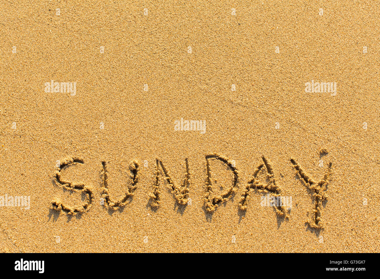 Sonntag - erstellt am Sandstrand. Stockfoto
