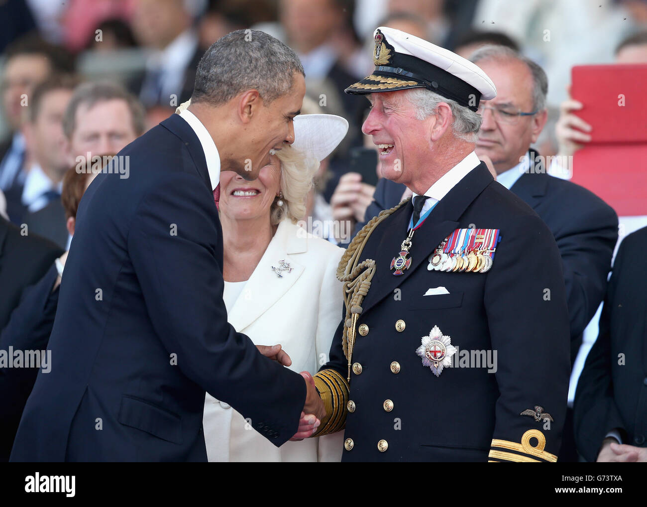 US-Präsident Barak Obama trifft den Prinzen von Wales während einer internationalen Zeremonie mit Staatsoberhäuptern am Sword Beach in der Normandie, um den 70. Jahrestag der Landungen des D-Day zu feiern. Stockfoto