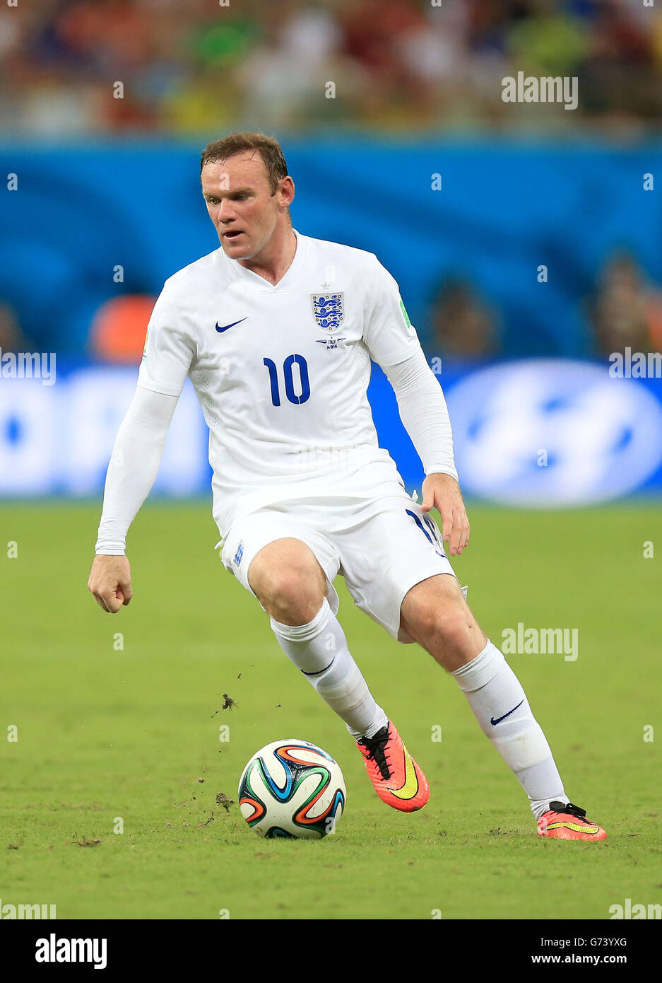 Der englische Wayne Rooney während des FIFA-Weltmeisterschaft-Spiels der Gruppe D in der Arena da Amazonia, Manaus, Brasilien. DRÜCKEN SIE VERBANDSFOTO. Bilddatum: Samstag, 14. Juni 2014. Siehe PA Story SOCCER England. Bildnachweis sollte lauten: Mike Egerton/PA Wire. Nur für redaktionelle Zwecke. Keine kommerzielle Nutzung. Keine Verwendung mit inoffiziellen Logos von Drittanbietern. Keine Bildbearbeitung. Keine Videoemulation Stockfoto