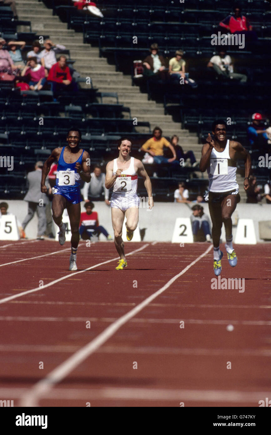 Leichtathletik, 100 Meter Männer. USA's Mel Lattany mit Jim Evans und Delwyne Clarke. Stockfoto