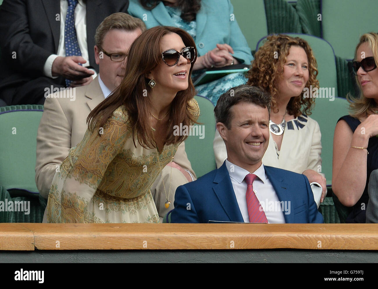 Tennis - Wimbledon Championships 2014 - Tag 4 - All England Lawn Tennis und Croquet Club. Dänemarks Kronprinz Frederik und Prinzessin Mary Stockfoto