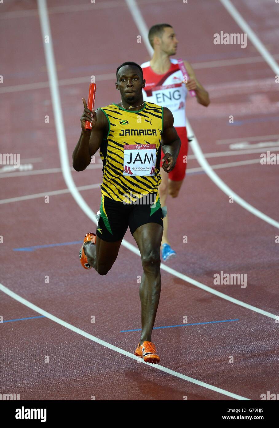 Jamaikas Usain Bolt feiert den Gewinn der Männer 4x100 m Staffel im Hampden Park, während der Commonwealth Games 2014 in Glasgow. Stockfoto