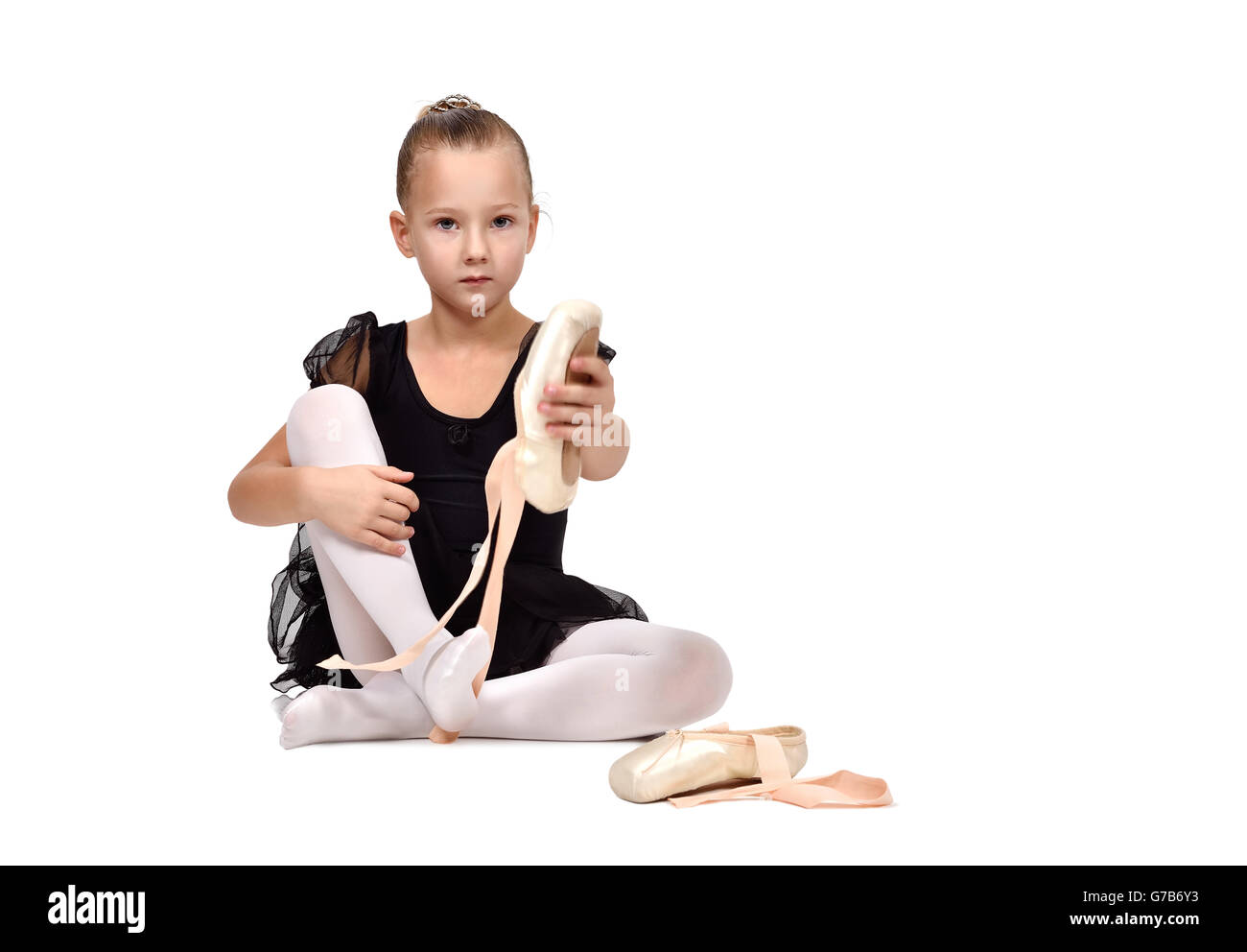 Ballerina in schwarz Tutu trägt Ballettschuhe Stockfoto