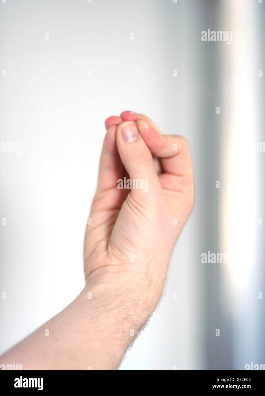 Allgemeine Ansicht einer männlichen Hand, die gestikuliert. Stockfoto