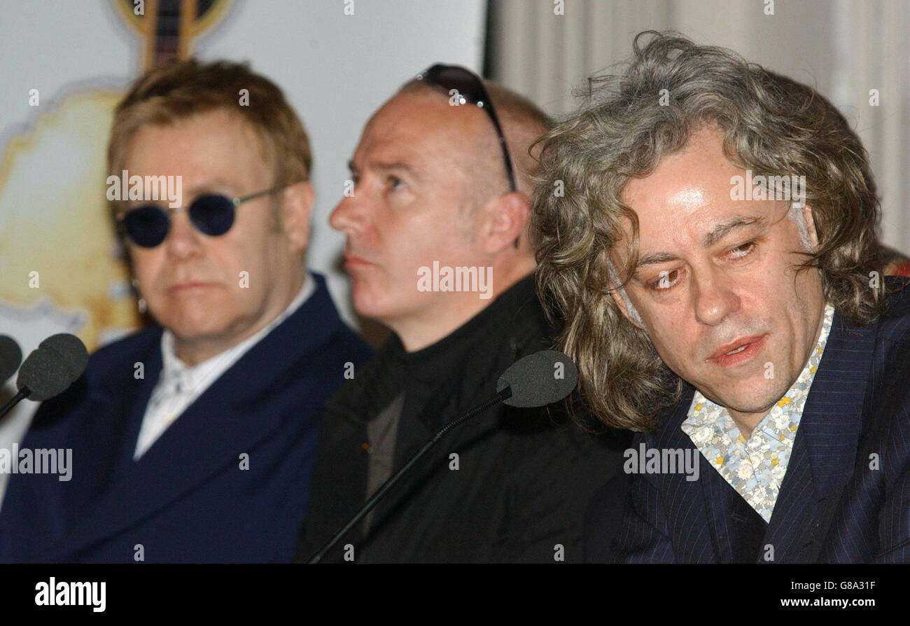 (Von links nach rechts) Sir Elton John, Midge Ure und Sir Bob Geldof. Stockfoto