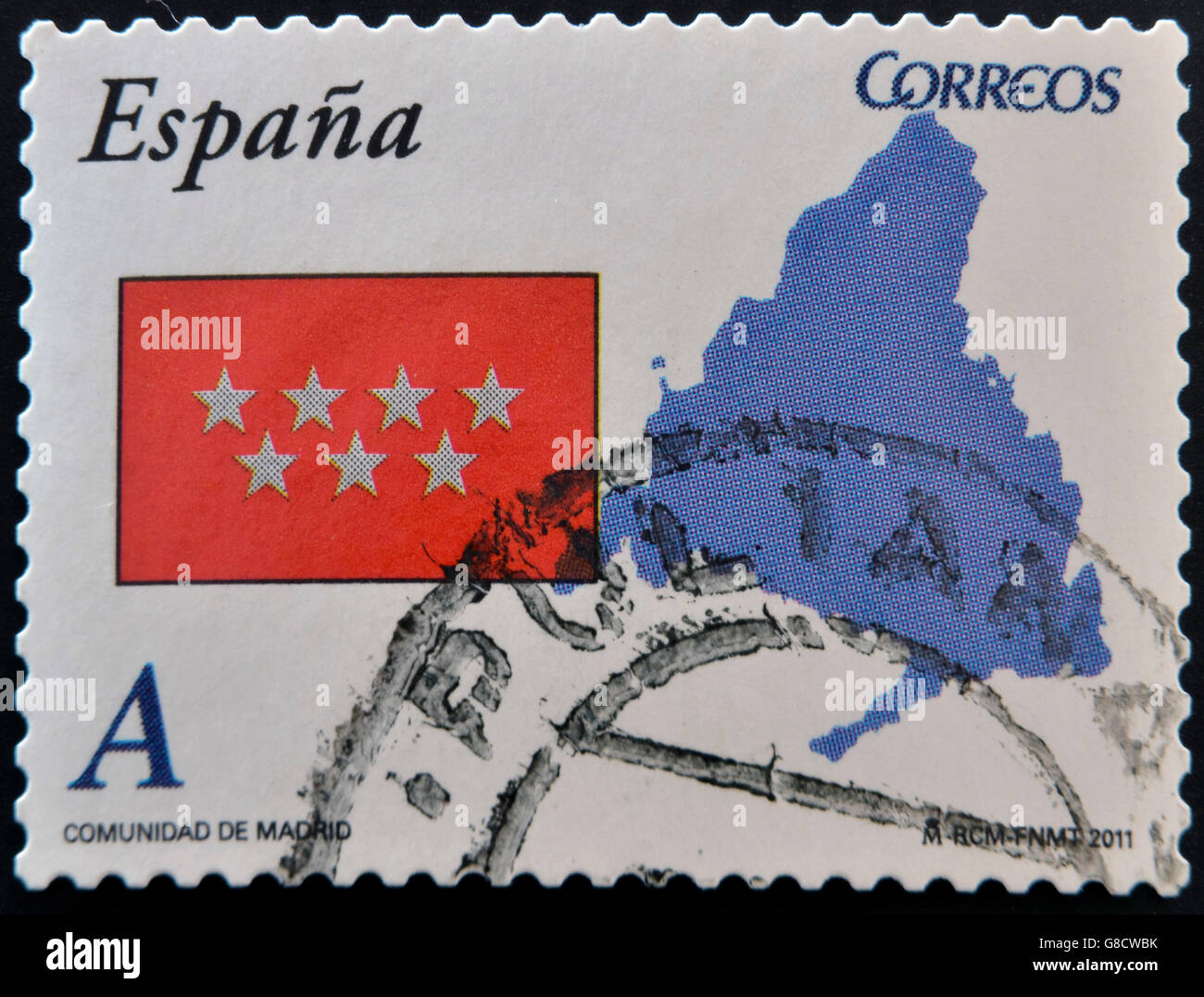 Spanien - ca. 2011: Eine Briefmarke gedruckt in Spanien zeigt Flagge und Karten der autonomen Gemeinschaft von Madrid, ca. 2011 Stockfoto