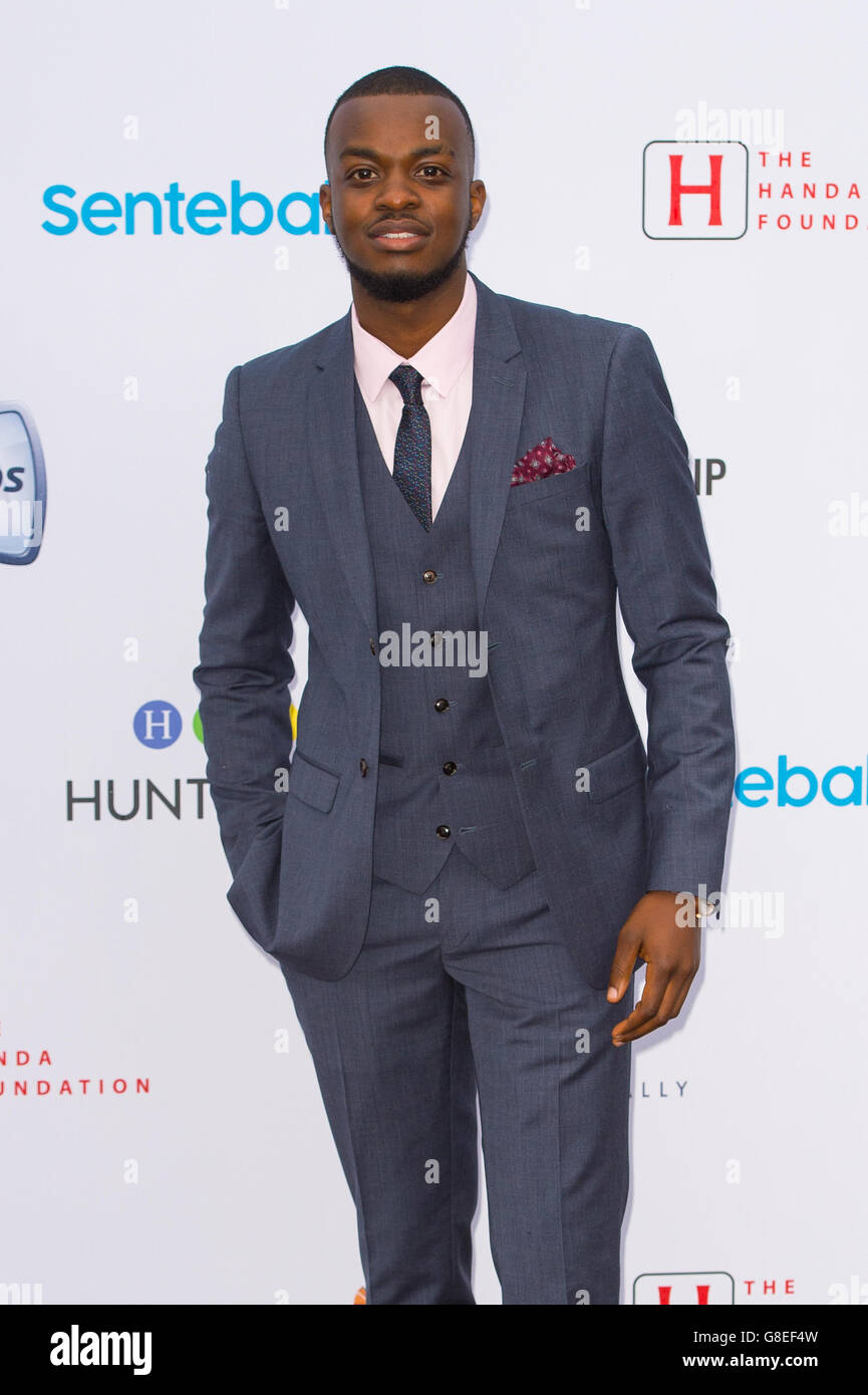 George Mpanga auch bekannt als George die Dichter, die Teilnahme an einem Konzert, veranstaltet von Prinz Harry Charity Sentebale im Kensington Palace Gardens, London, um Bewusstsein und die Mittel für Jugendliche mit HIV in Afrika südlich der Sahara zu erhöhen. Stockfoto
