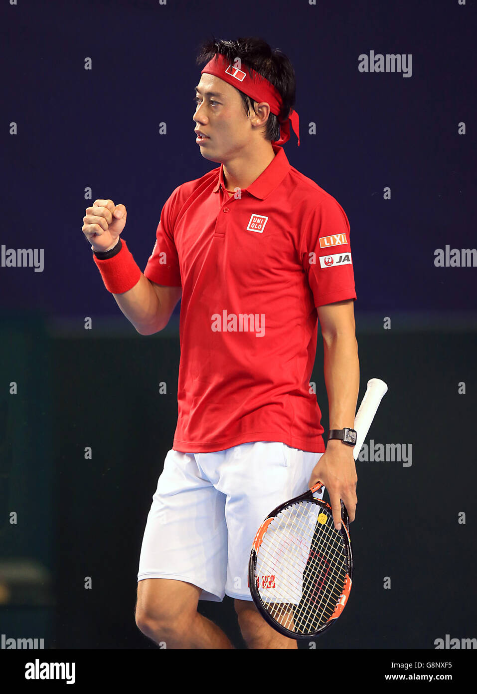 Der japanische Kei Nishikori feiert seinen Sieg gegen den Briten Dan Evans am ersten Tag des Davis Cup, World Group, First Round in der Barclaycard Arena, Birmingham. Stockfoto