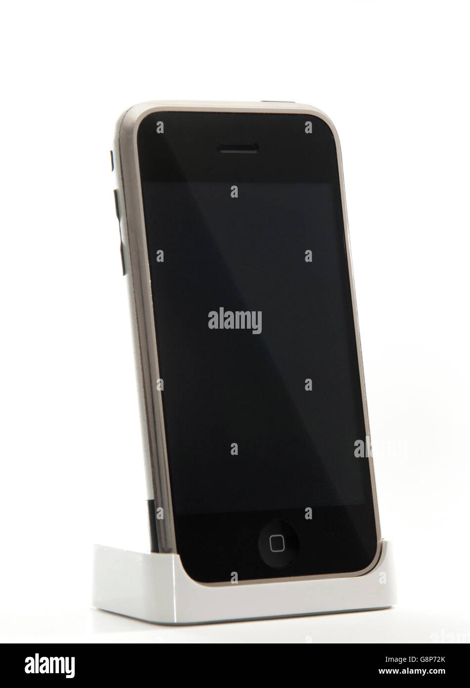 Altes iPhone 2 G auf weißen Hintergrund isoliert Stockfoto