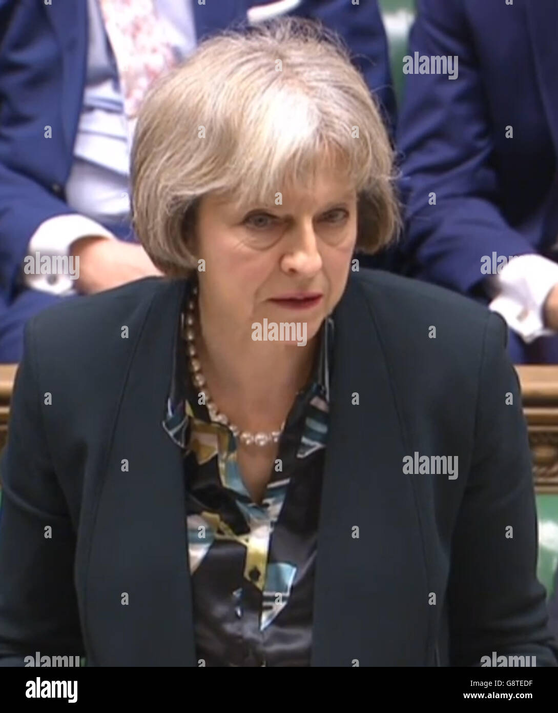 Innenministerin Theresa May, die im Londoner Unterhaus eine Erklärung zu den Brüsseler Terroranschlägen abgegeben hat. Stockfoto