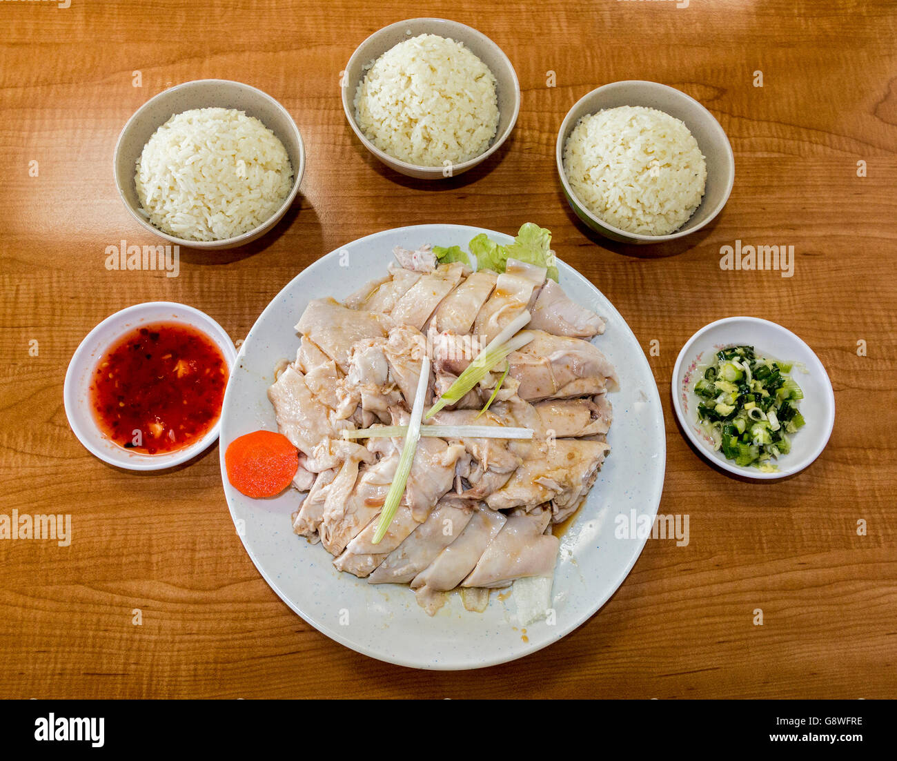 Hainan-Huhn ist mehr als nur einen Teller mit zerschnitten Huhn. Stockfoto