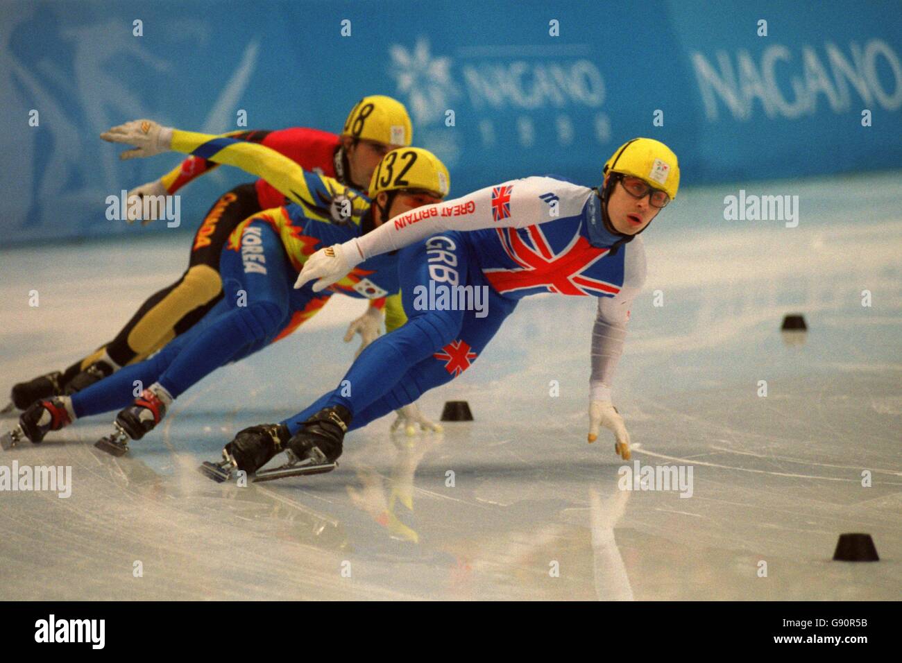 Short Track Speed Skating - Olympische Winterspiele - Nagano 1998 - Qualifikation der Männer über 1000 Meter. John Nichola Gooch, Großbritannien, in Aktion Stockfoto