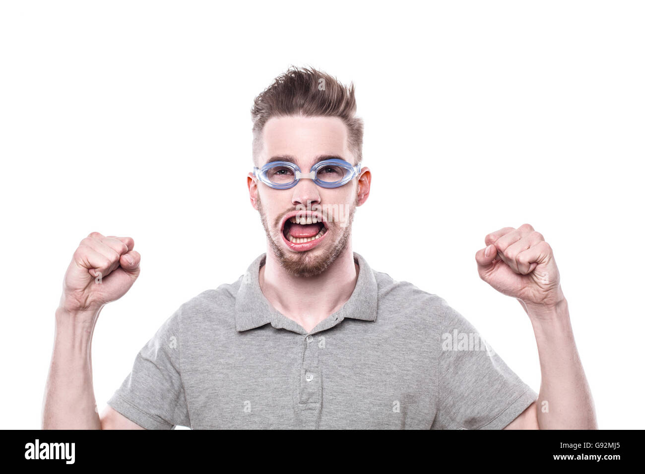 Lustiges Konzept für Mann mit vom Wind verwehten Mund. Mann, eine Brille und zeigt Erfolge. Isoliert auf weißem Hintergrund Stockfoto