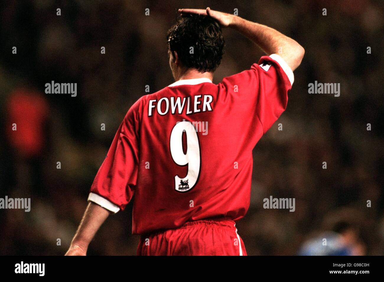 Fußball - FA Carling Premiership - Liverpool / Everton - Anfield. Robbie Fowler von Liverpool legt seine Hand auf seinen Kopf Stockfoto