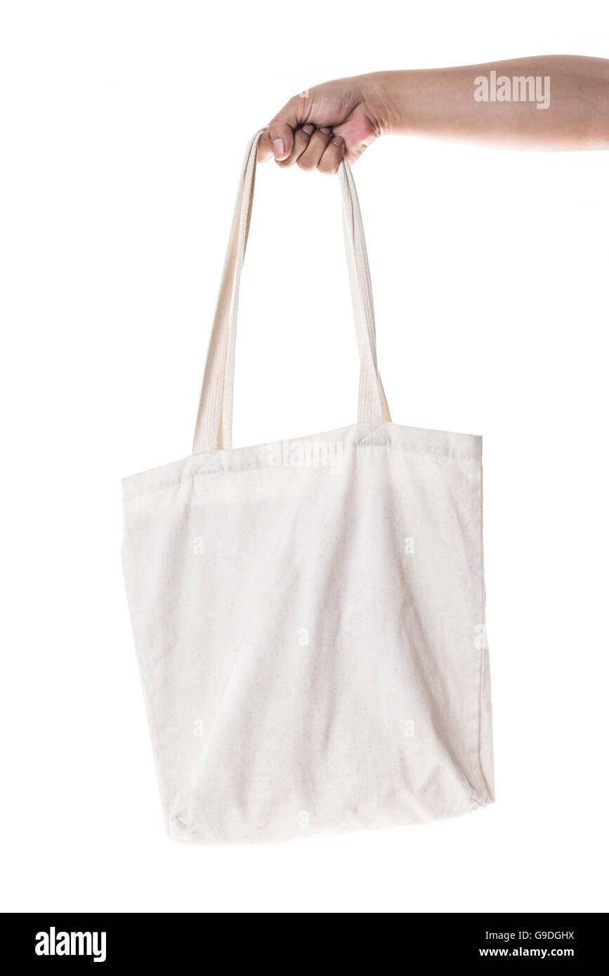 Hand, die Baumwolle Öko Tasche auf weißem Hintergrund Stockfoto